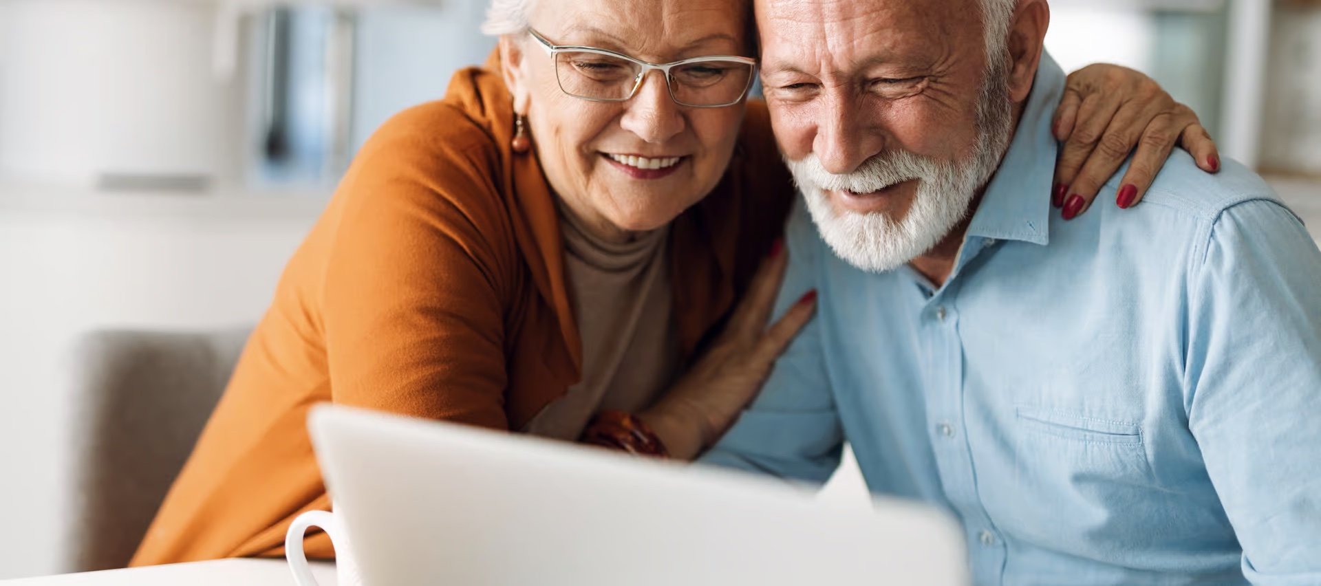 Older couple looking over documents